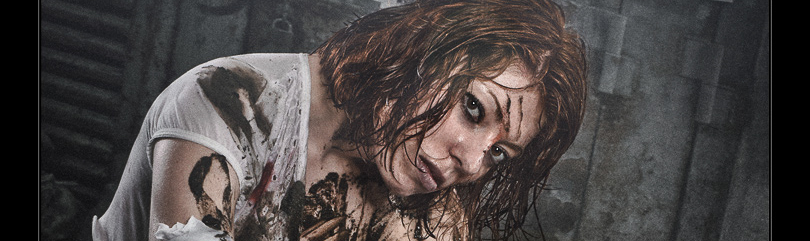 Resting Fighter - Erotic Dirty-Style with beautiful model covered in dirt sitting with gun showing her left naked breast and nipple because of a ripped of shirt wearing tight sexy jeans hotpants - © by Magistus