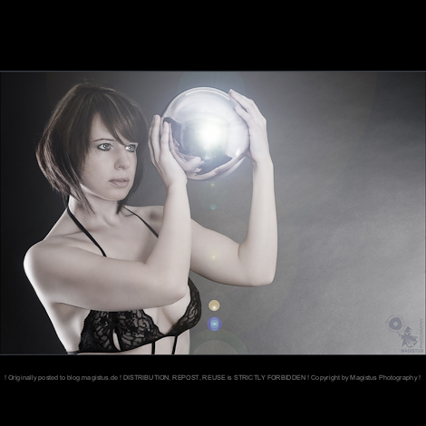 Light Ball - Beauty Lingerie Portrait with beautiful model holding a shiny metal ball in her hands wearing sexy black lingerie - © by Magistus