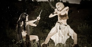 Fight in Rain - Amazon Shooting in the Rain with two great sword fighting models wearing sexy leather tops and short skirts - © by Magistus