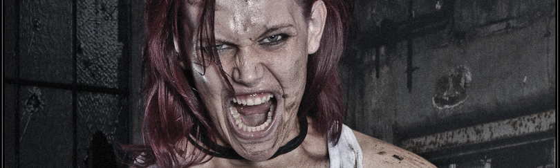 Blood Fight - Erotic Crazy Girlfight Shooting with a insane model posing with bloody fists in a dirty wet ripped off tank top showing her boobs wearing short tight jeans hot pants. - © by Magistus