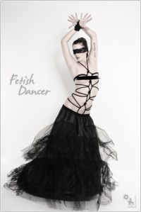 Fetish Dancer - Fetish Nude Art Shooting with fantastic topless model in a black skirt only wearing black bondage on her naked body with posing with her hands bound and her eyes blindfolded - © by Magistus