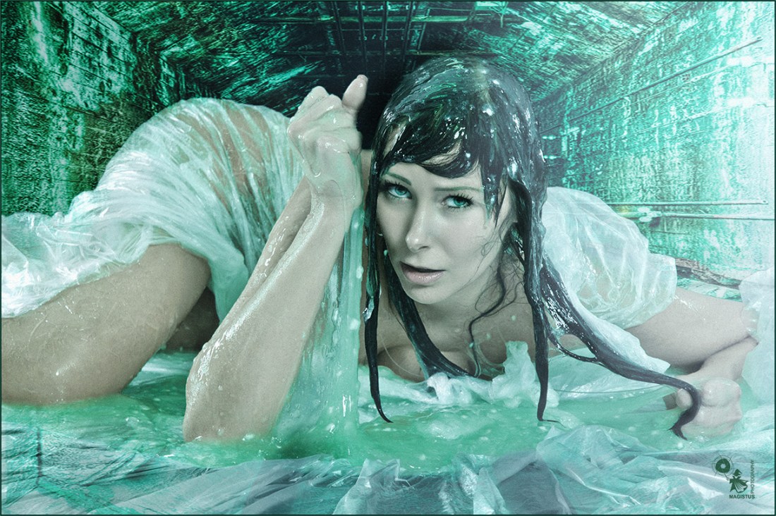 Alien Dungeon - Super sexy and nude model is posing in green slime in a dungeon - Artwork © by Magistus - Background Image © by Grischa Georgiew - Fotolia.com