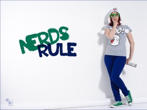 Nerds Rule - Funny Portait Shooting with a sweet nerdy girl sprying on a white wall. - © by Magistus