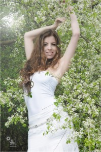 Spring Time - Beauty Portrait in Nature with a fantastic model dressed in white posing in flowers - © by Magistus