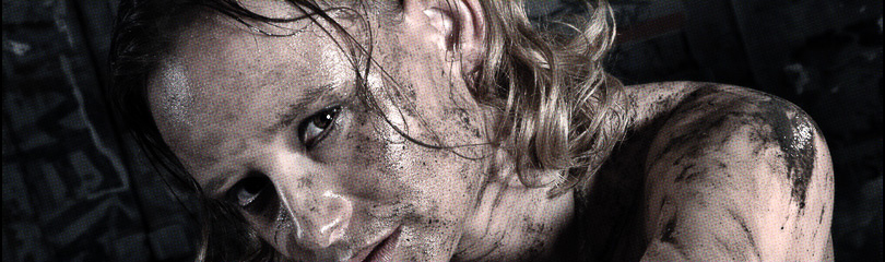 Helpless - Bondage & Fetish Art with a bound and naked girl and her naked body covered in mud and dirt looking into the camera. - © by Magistus