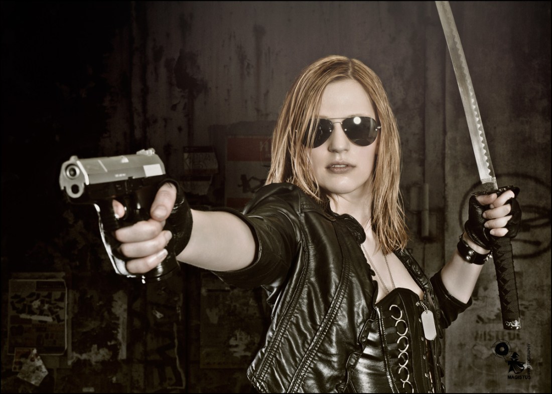 Urban Shooter - Sexy & Cool Fightergirl Shooting and Composing wearing a black corsage and sunglasses posing with a gun and samurai sword - © by Magistus