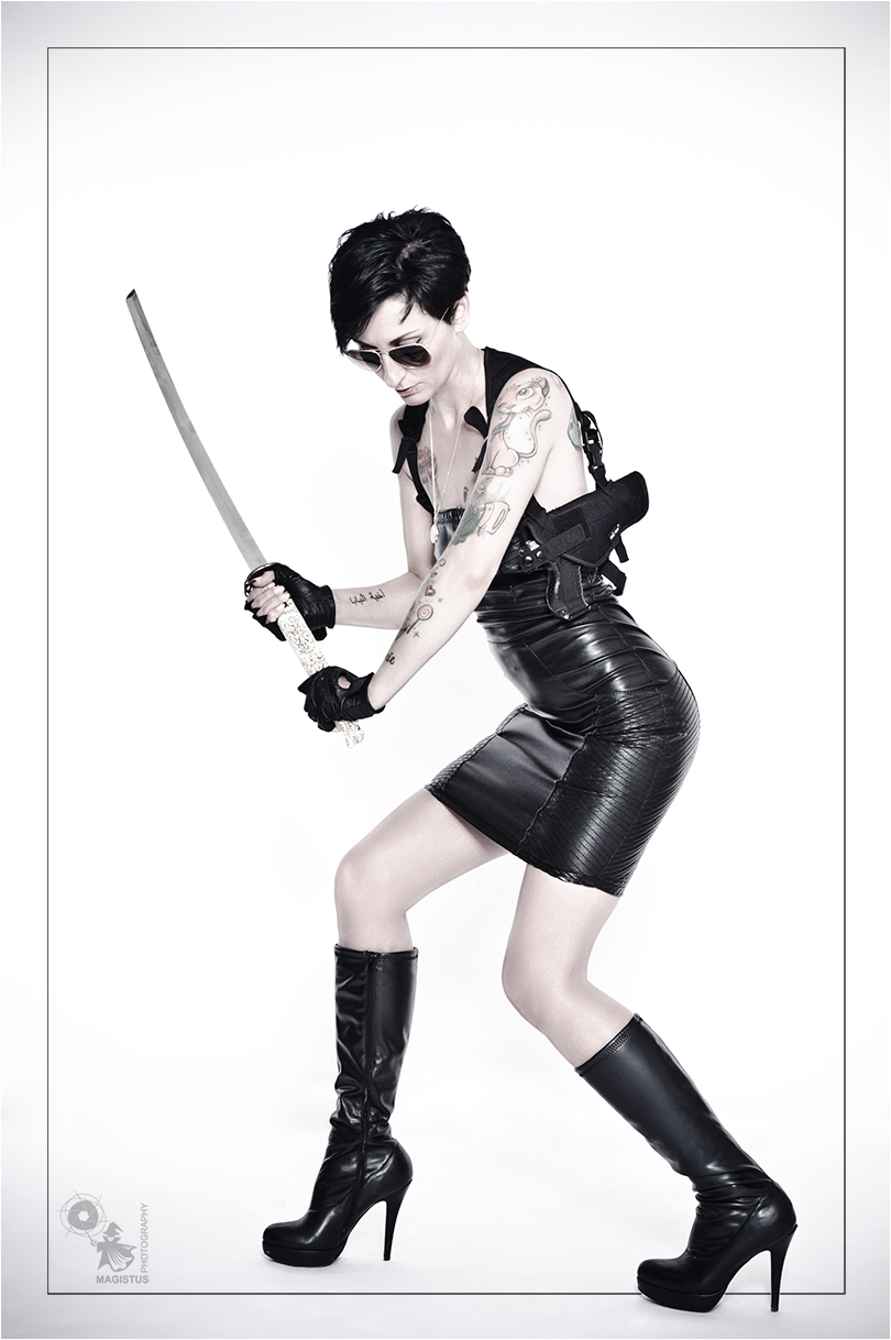 Modern Samurai - Fightergirl Photoshoot with a cool model wearing a black tight skirt and boots with a samurai sword in her hands - © by MagistusFoto