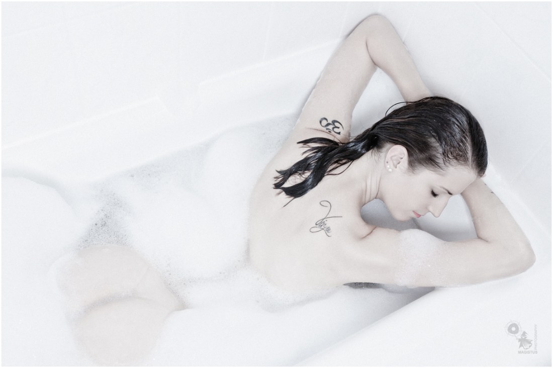 Bathing Beauty - Nude Art OnLocation Photoshoot with a fantastic model dreaming naked in the bathtube showing her beautifull sexy back. - © by Magistus