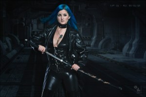 SciFi Fightergirl - Sexy Spaceship Fighter Composing with sexy and busty blue haired girl posing in tight leather clothes showing off a lot of cleavage posing with a samurai sword - Artwork © by Magistus - Background by BrownzArt http://brownzart.wordpress.com
