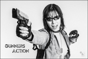 Gunners Action - Sexy Action Photoshoot with topless girl screaming and pointing with a gun. - © by Magistus