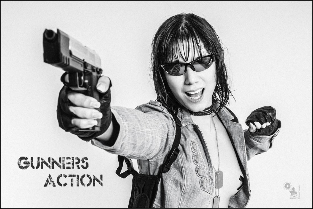 Gunners Action - Sexy Action Photoshoot with topless girl screaming and pointing with a gun. - © by Magistus
