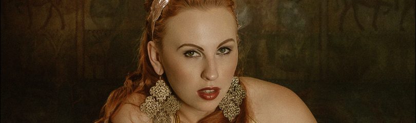 Roman Decadence - Erotic Nude Composing with busty model posing with gold on the floor with her naked tits hanging out of her robe. - © by Magistus