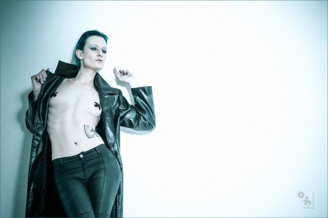 Cold N Sexy - Nude Art Photoshoot with fantastic hot skinny model posing in tight black pants and a black leather jacket half naked. - © by Magistus