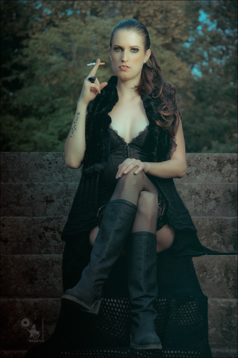 Dominance - Hot Fetish Editorial Picture with a fantastic smoking model in black corsage - © by Magistus