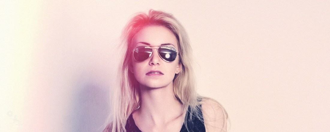 New York - Super sexy jeans portrait with hot girl wearing sunglasses and a half transparent seethrough top. - © by Magistus