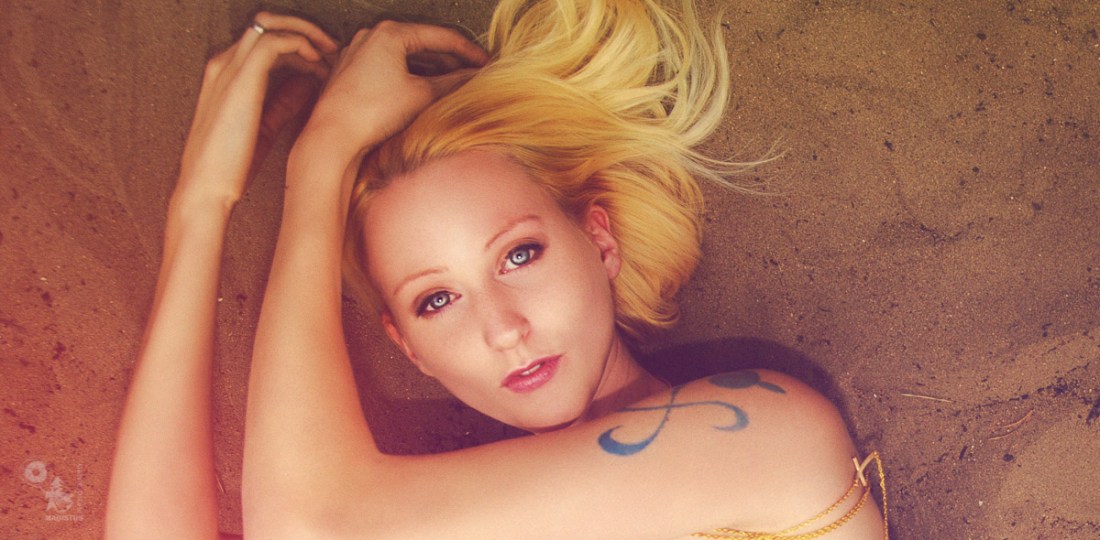 Nude Sand - Beautiful Nude Art Photo of a super pretty naked blonde girl posing in the summer sand presenting her tight body. - © by Magistus