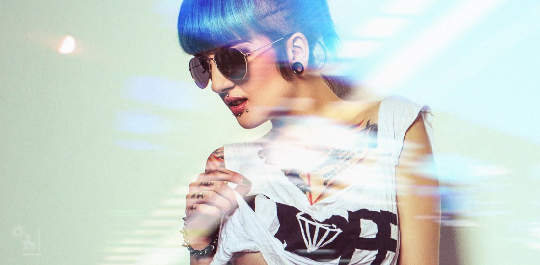 City Lights - Sexy Alternative Model Intensivstati0n Prinzessin is posing sexy in tiny Hot Pants and shirt showing a little underboob. - © by Magistus