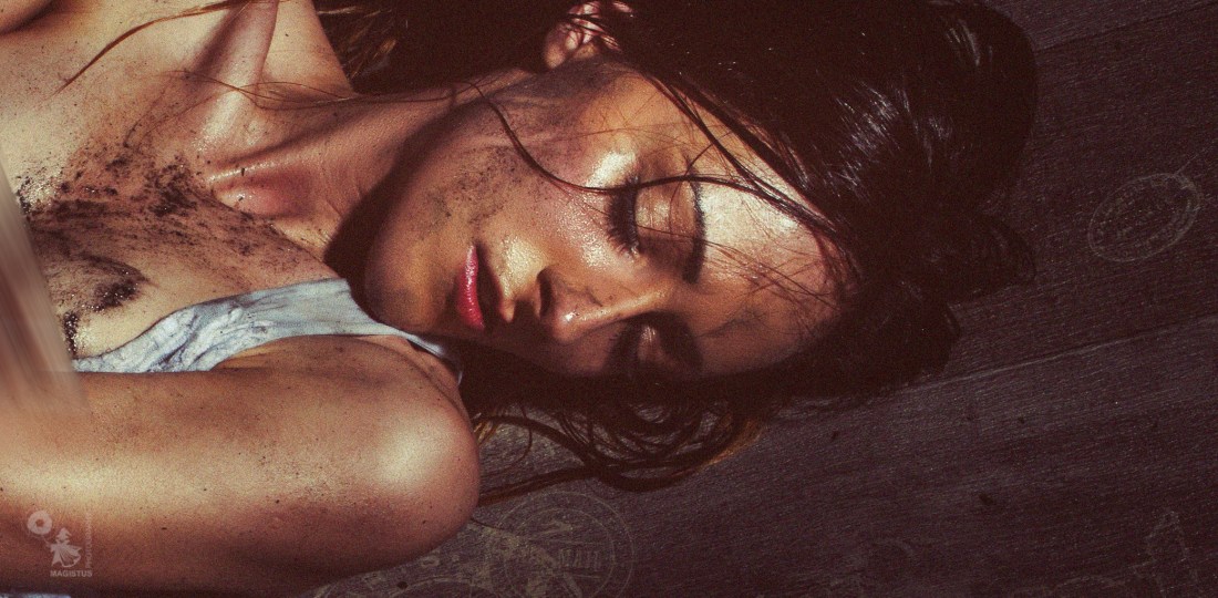 Bound In Dirt - Erotic BDSM Fetish Picture of a half naked girl covered in mud with her Hands bound showing her naked boobs. - © by Magistus