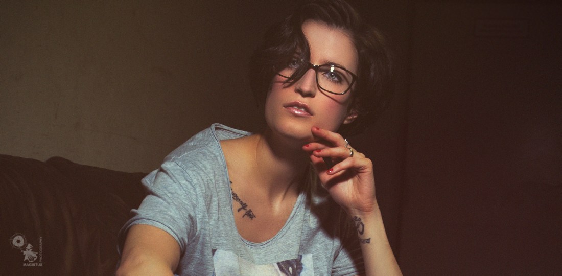 Easy - super beautiful model is posing in jeans in a dark place - © by Magistus