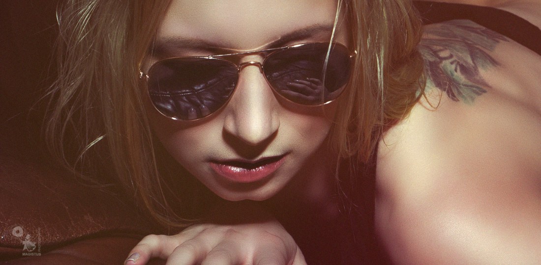 Cool Jeans Hotpants - Sexy blond girl is posing in tight vintage jeans hotpants showing her hot booty wearing sunglasses - © by Magistus