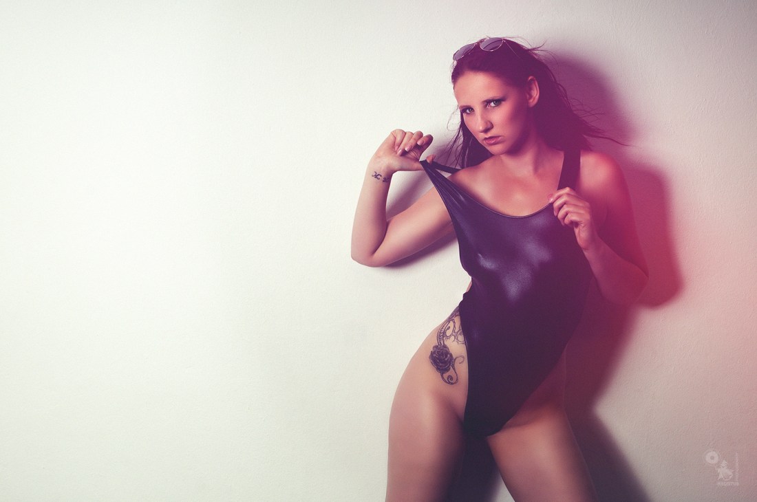 Black Body - sexy model is posing in a shiny black body - © by Magistus