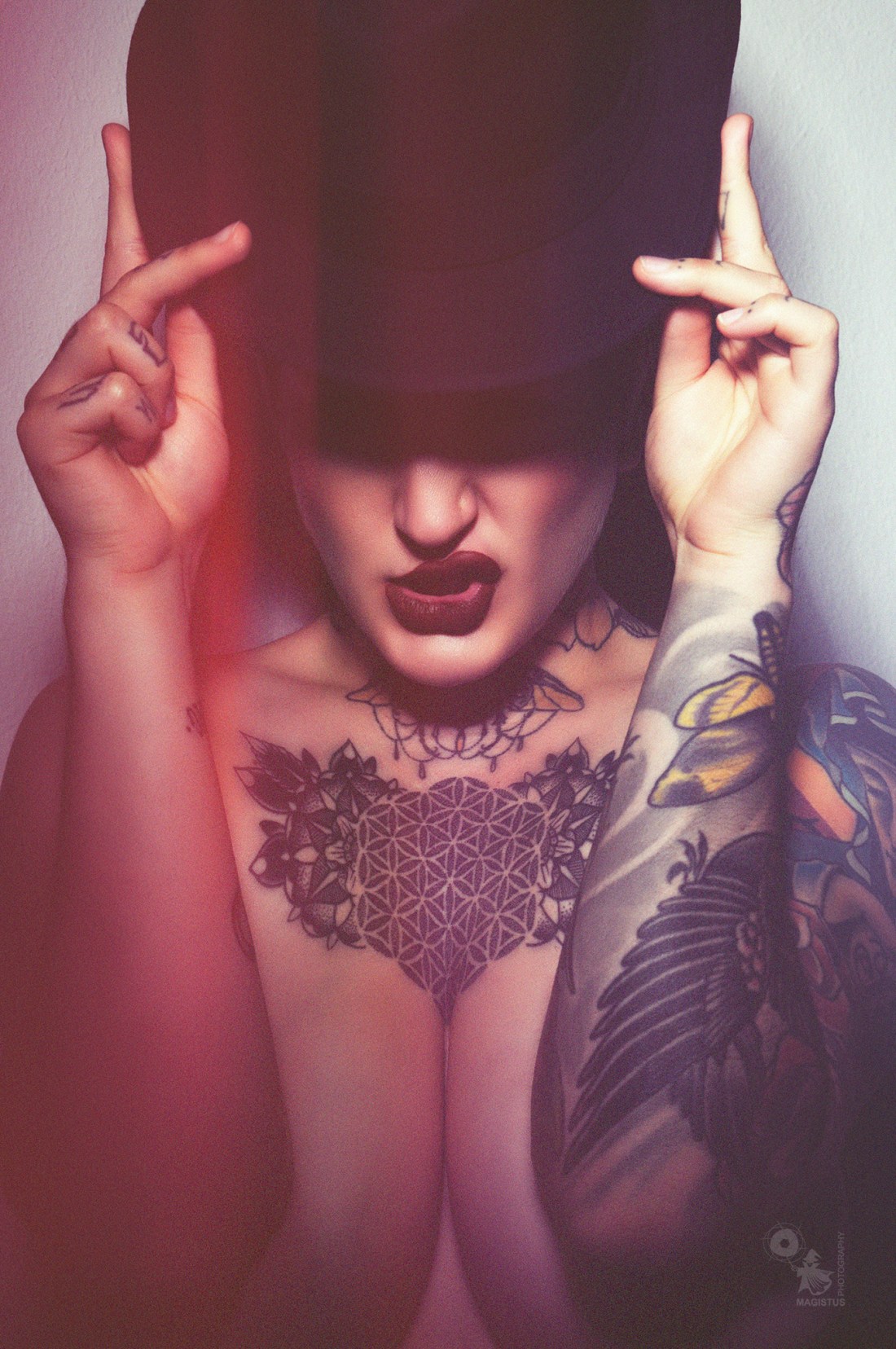Close up - super coole close up portrait with a tattooed alternative model showing a big cleavage. - © by Magistus