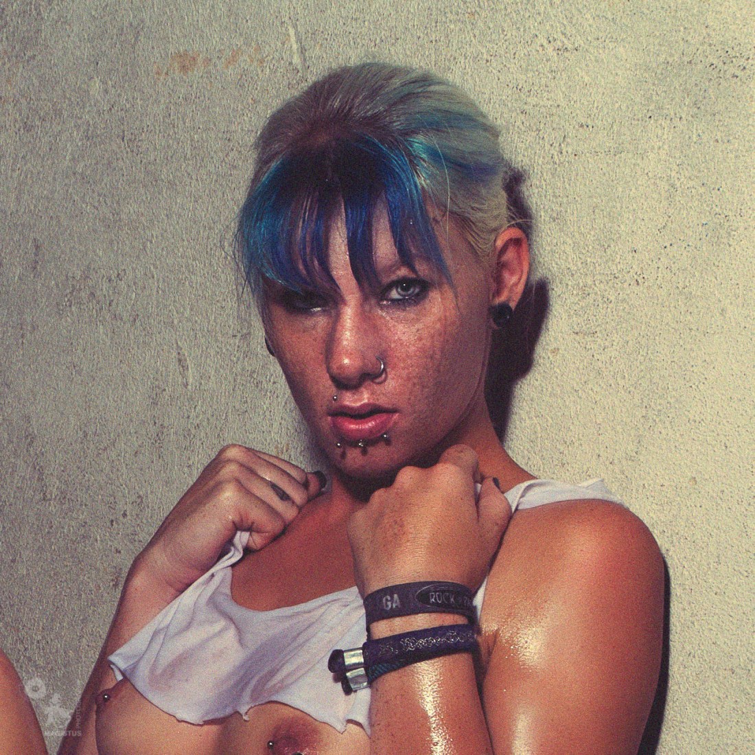 Wetlook Girl - super sexy alternative model is posing topless in tight jeans hotpants showing her naked pierced tits. - © by Magistus