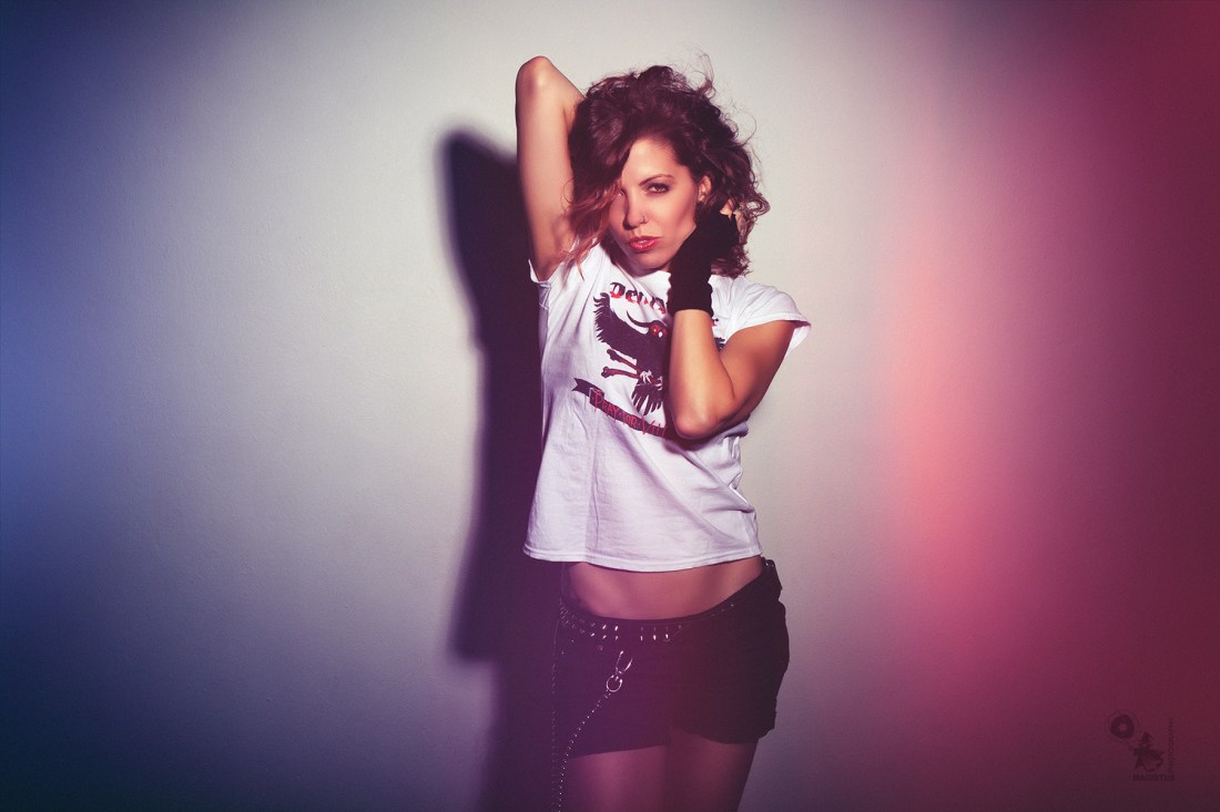 Devil - super hot and sexy metal girl is posing in black hotpants showing her pervect belly - Copyright by Magistus