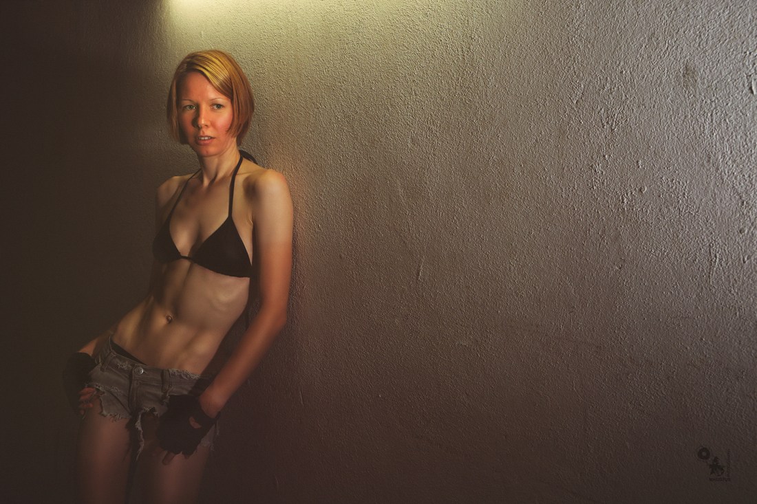 Fit in Jeans - fantastic and sexy fitness model in tight short jeans hotpants and bikini top - © by Magistus