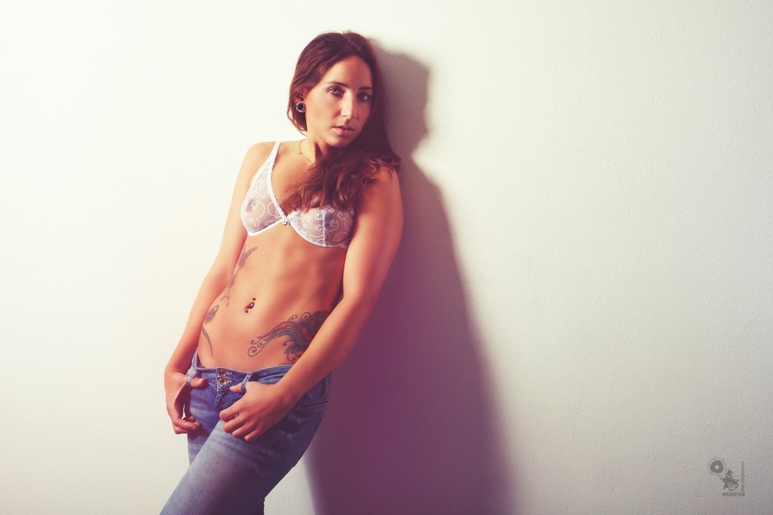 Jeans Lingerie - super hot and sexy model is posing in blue jeans and a seethrough white bra. - © by Magistus